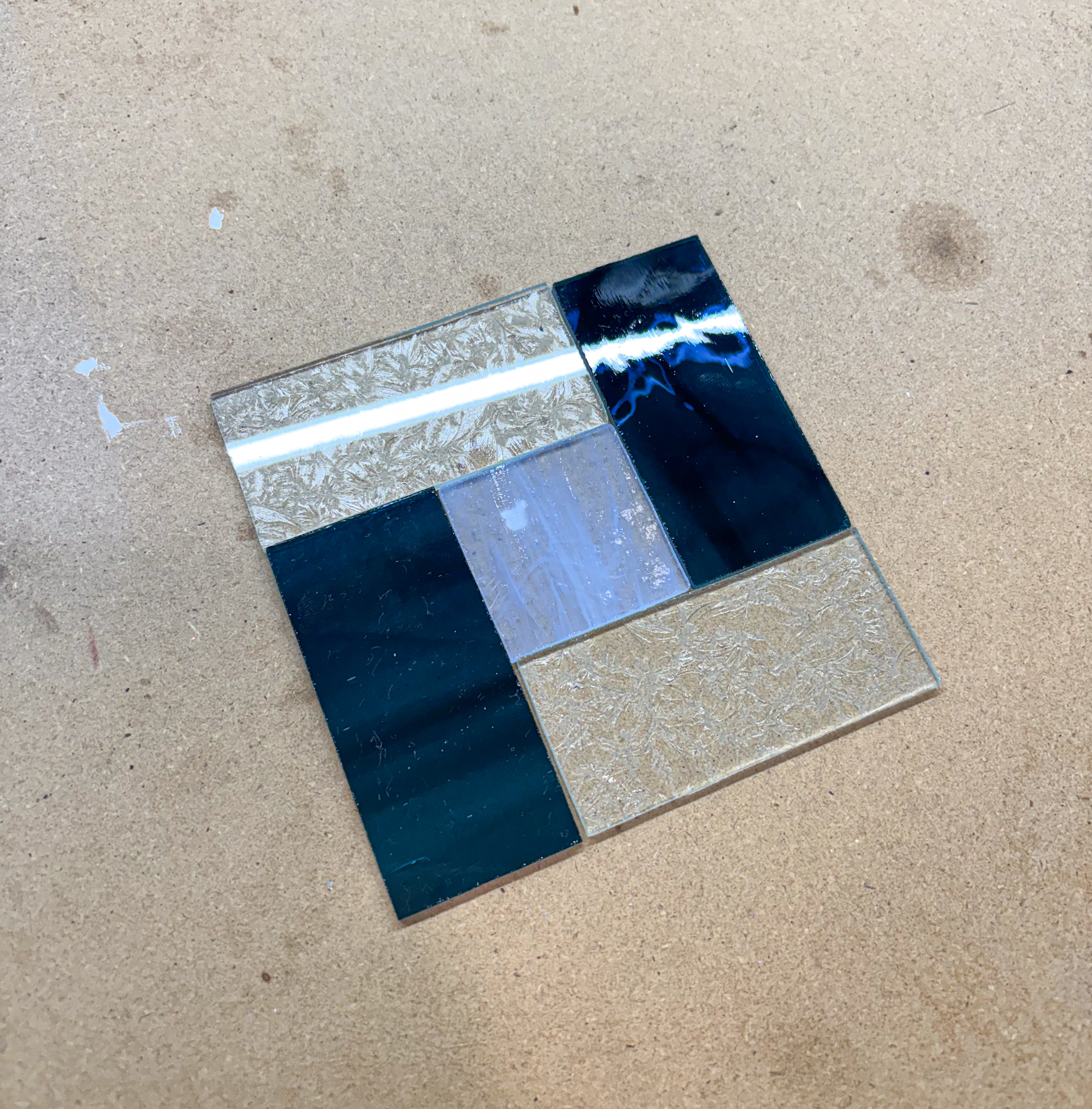 Simple Suncatcher — a pinwheel of deep-blue and textured amber glass
